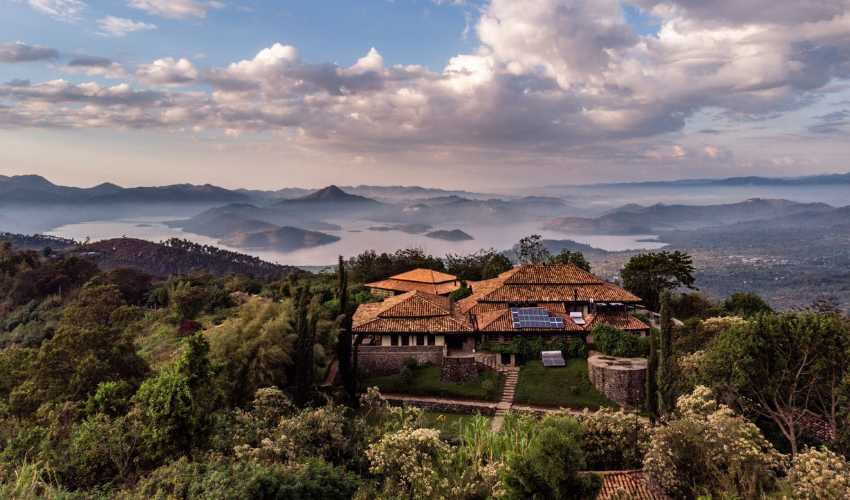 Virunga Lodge perched on a hillside with views of the Virunga Volcanoes and lakes